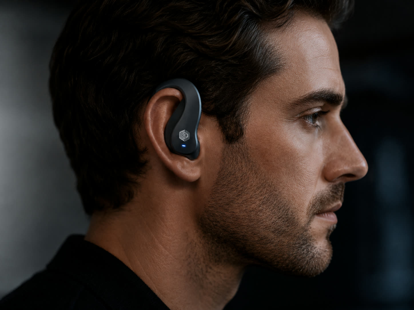 Cogito, the MachineDigit ear-worn sensor, in place behind a tester's ear