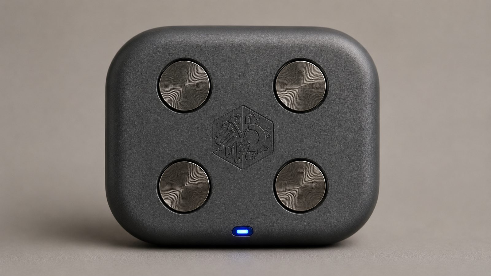 Underside of PsiCore, the MachineDigit temple-patch sensor, showing its four dry-contact EEG electrode pads around the central emblem